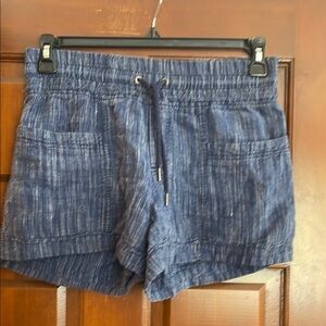 Athleta space striped linen shorts with two front pockets and two back pockets